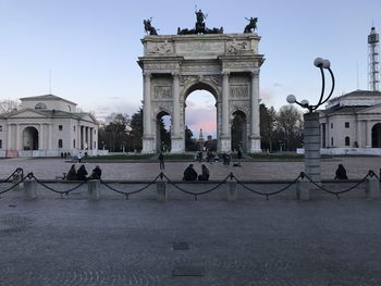 Group of people in front of historical building