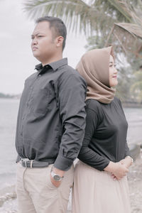 Couple standing outdoors