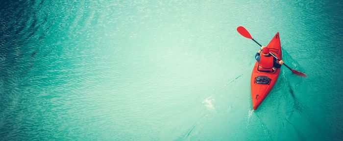 High angle view of red boat in sea