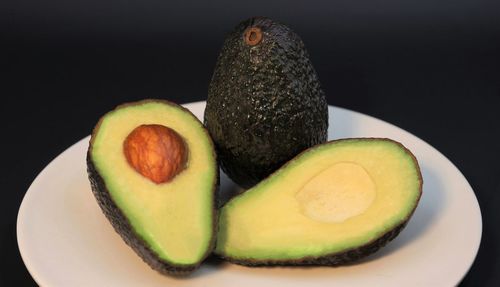 Close-up of fruits in plate on table