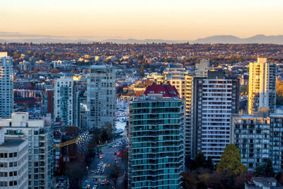 High angle view of buildings in city against sky