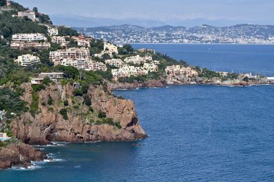 Town by sea and buildings in city