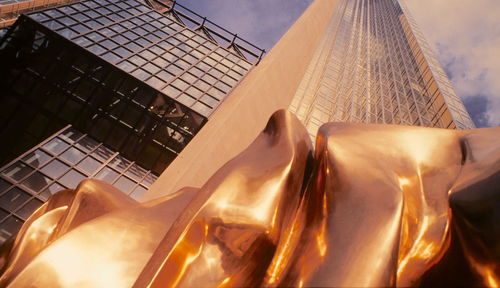 Low angle view of man against building