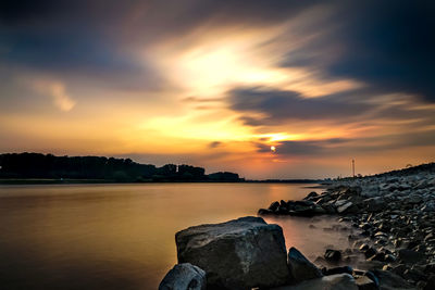 Scenic view of sea against sky during sunset