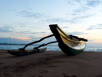 Boats moored at seaside