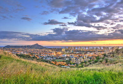 Panoramic view of townscape against sky during sunset