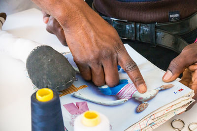 High angle view of man working on table