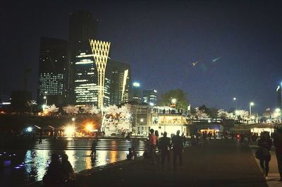 Skyscrapers in city at night