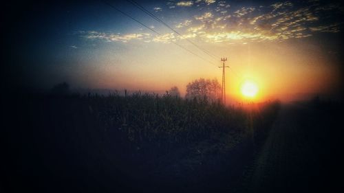 Scenic view of landscape at sunset