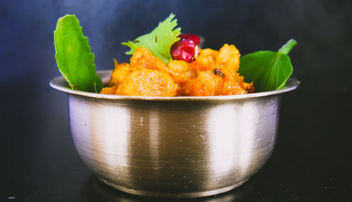 Close-up of fruits in bowl on table