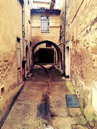 Narrow alley with buildings in background