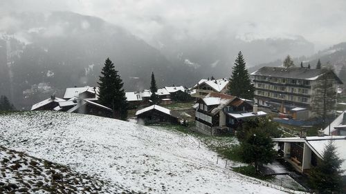 Panoramic view of buildings in city during winter