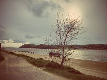 Scenic view of sea against cloudy sky