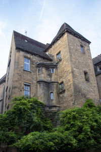 Low angle view of old building against sky