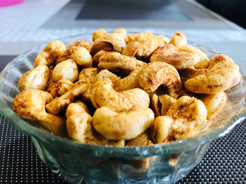 High angle view of cashews in container on table