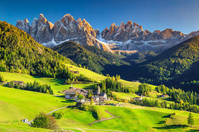 Scenic view of landscape and mountains against sky