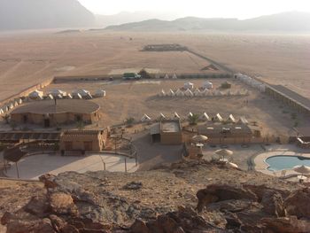 High angle view of buildings against mountain range