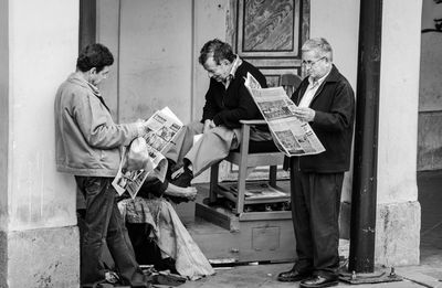 Group of people sitting on the floor