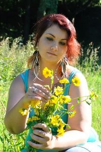 Woman in a meadow with flowers