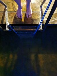 Low section of people standing on staircase