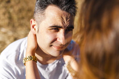 Close-up portrait of a young couple