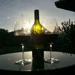 Close-up of wine bottles on table