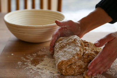 Midsection of person preparing food