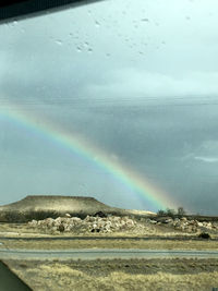 Scenic view of rainbow against sky