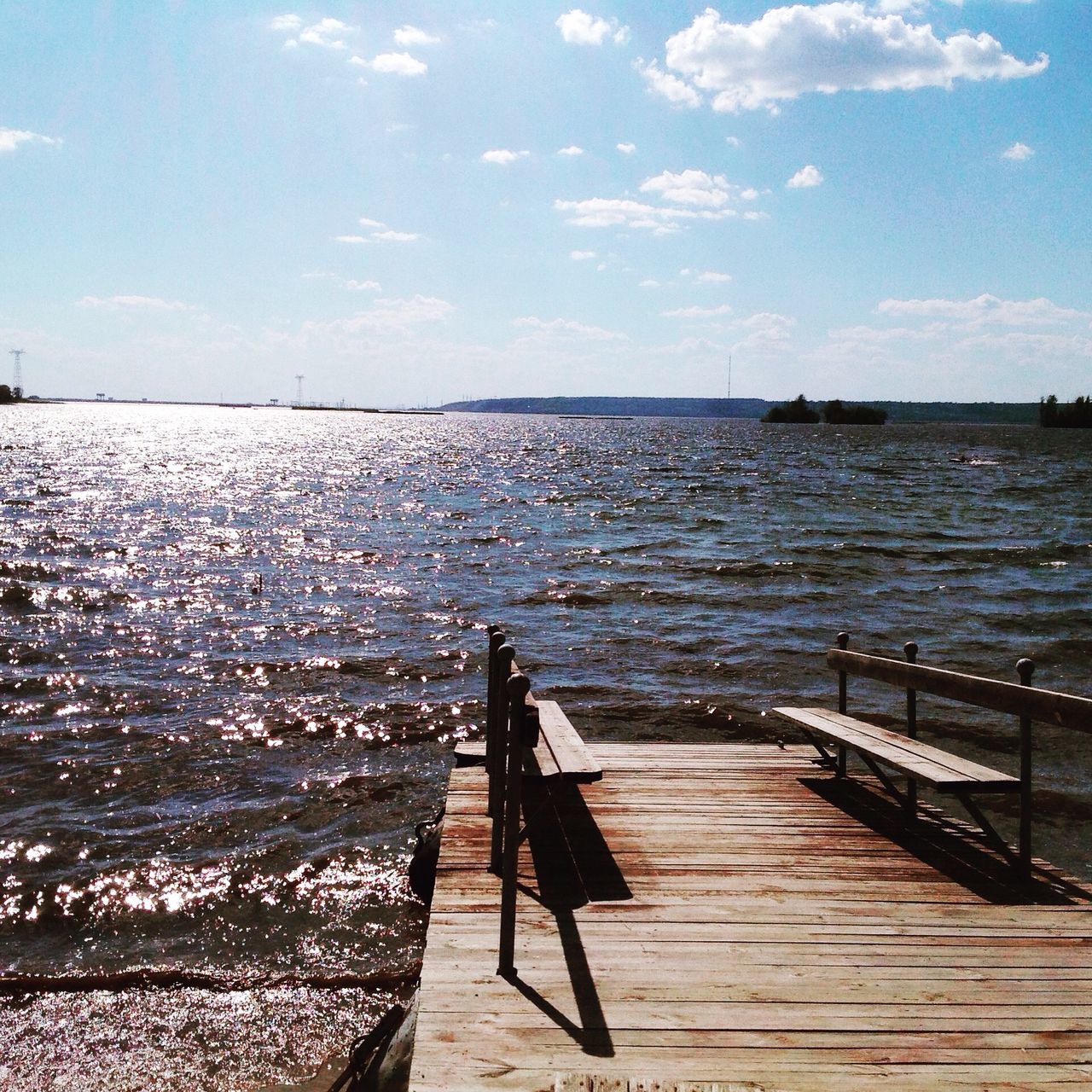 water, pier, sky, sea, wood - material, tranquil scene, tranquility, blue, boardwalk, railing, scenics, the way forward, beauty in nature, nature, jetty, wood, sunlight, wood paneling, idyllic, rippled