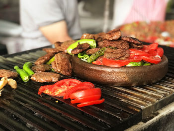 Close-up of meat on barbecue