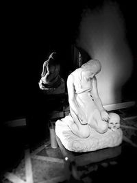 Woman standing at night