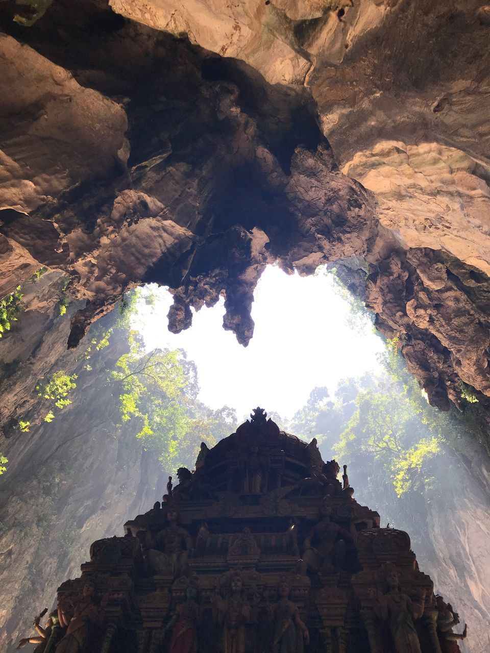 LOW ANGLE VIEW OF ROCK FORMATIONS AT TEMPLE