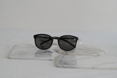 Close-up of sunglasses on table