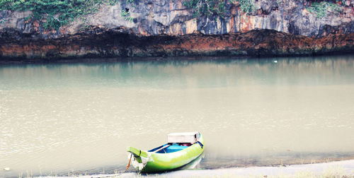 Boat floating on lake