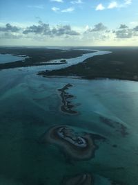 Scenic view of sea against cloudy sky