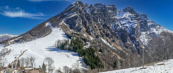 Mount resegone with snow and a blue sky