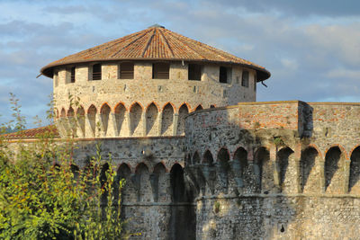 Detail of the firmafede fortress on the sky background.