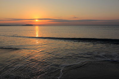 Scenic view of sea against sky during sunset