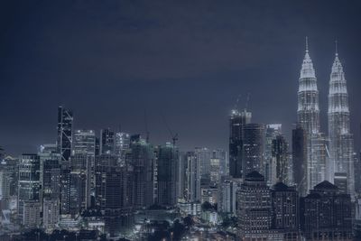 Skyscrapers in city at night