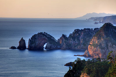 Scenic view of sea against sky during sunset