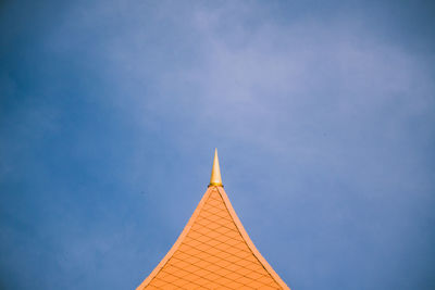 Low angle view of building against blue sky