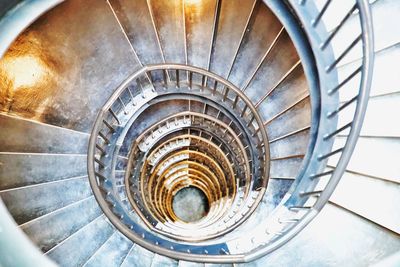 Directly below shot of spiral staircase in building