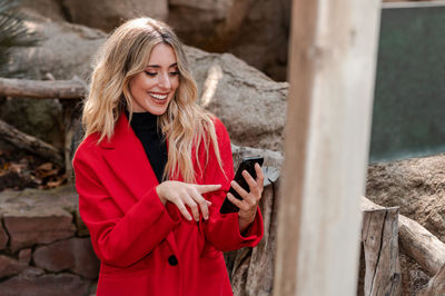 Young woman using mobile phone