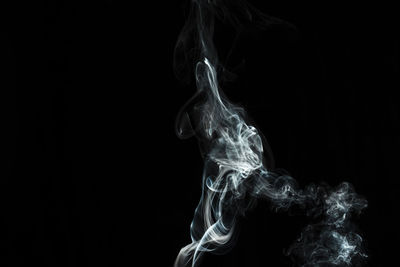 Close-up of fire against black background