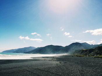 Scenic view of beach against sky