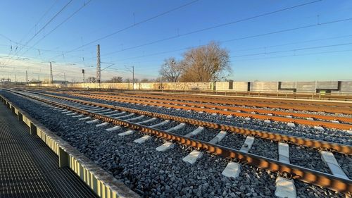 Railroad tracks against clear sky