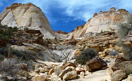 Low angle view of mountain against cloudy sky
