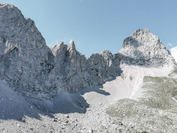 Scenic view of lamsenspitze and other rocks against clear sky, karwendel, tyrol