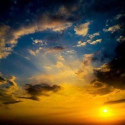 Scenic view of dramatic sky during sunset