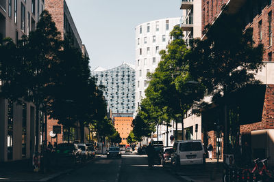 City street amidst buildings against sky